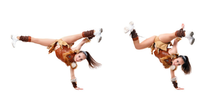 Young professional cheerleader dressed in a warrior costume standing on one hand. Horizontal splits, girl doing acrobatic and flexible tricks, image set