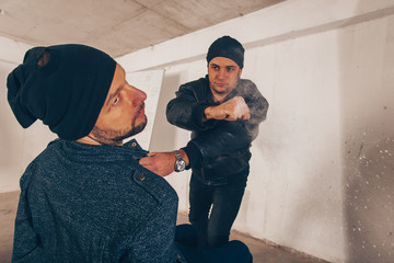 Criminal man punched his partner in the face