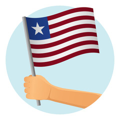 Liberia flag in hand