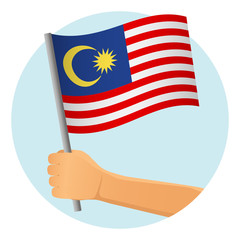 Malaysia flag in hand