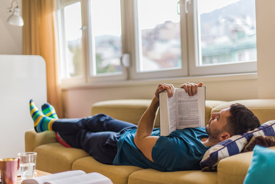 Interested man reading a book
