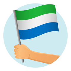 sierra leone flag in hand