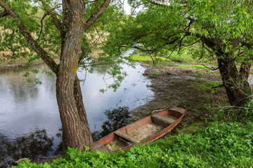 wooden boat on the river