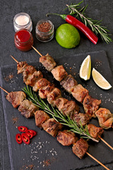 Fresh hot kebab with rosemary, lime and chili. Keto diet. Paleo diet. Pegan diet.