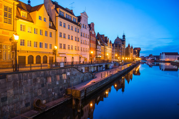 Gdansk at night with reflection in Motlawa river, Poland