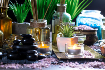 Fototapeta na wymiar Items for spa massage in the composition on the table