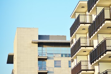 Modern apartment buildings on a sunny day with a blue sky. Facade of a modern apartment building