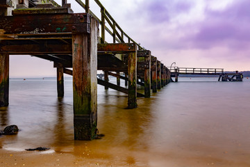 Pier under purple sky 1
