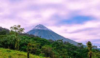 Fototapeta na wymiar Sunset Arenal Volcano La Fortuna Costa Rica - Purple Clouds