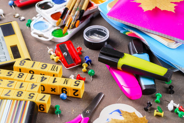 Back to school. Items for school classes in the composition on the table.
