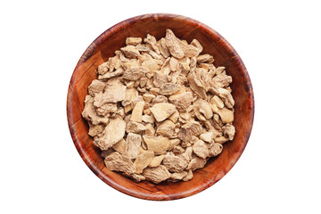 Top view ginger root pieces in a round wooden bowl. Kitchen spices container isolated on white studio background.