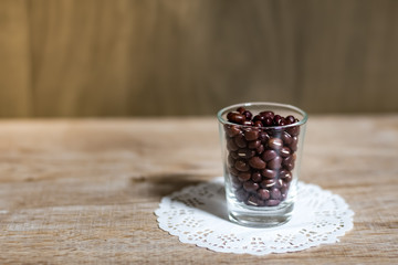 Cereals in glass cups placed on a wooden background