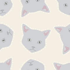 Cute vector pattern with cat head on beige background. Colorful seamless illustration of cartoon animal.