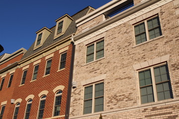 Fototapeta na wymiar Architectural details of modern townhouses, low camera angle view. Virginia, USA