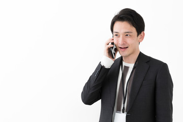 portrait of young asian man wearing suit isolated on white background