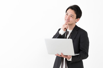 portrait of young asian man wearing suit isolated on white background