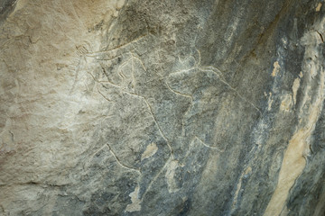 Gobustan,Azerbaijan.A national treasure,a landmark,a rocky area with a rich and ancient history.district of Azerbaijan.The rock carvings of ancient tribes. The drawings depict animals and hunting.