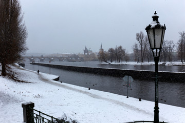 Snowy foggy Prague Old Town in Snowstorm, Czech republic