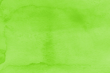 Watercolor green texture with abstract washes and brush strokes on the white paper background. Digital paper background.