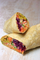 vegetable pancake vegan with sauce, carrot, onion,  parsley and cabbage