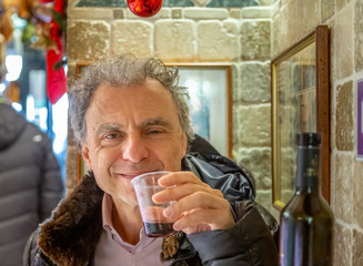 tipsy man drinking wine