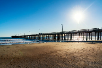 Fototapeta premium Beach and Pier on a Sunny Day