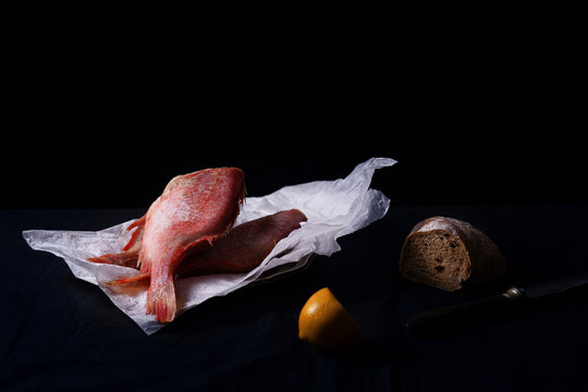 Close up of raw perch fish on plastic