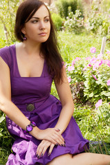  young woman outdoor in the grass in summertime 