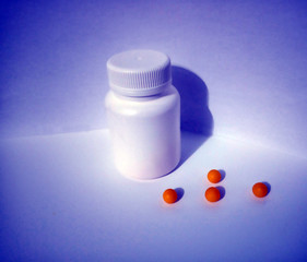 white medicine bottle of pills indigo