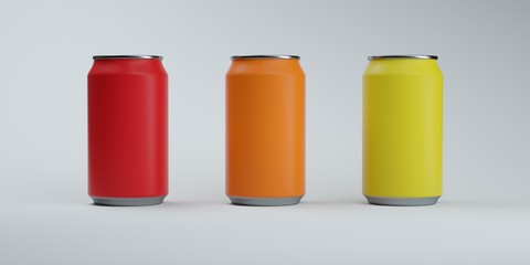 Three colors soda cans on elegant white background