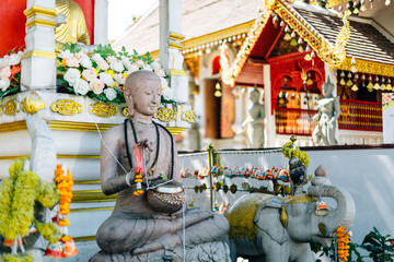 Statue in the outdoor garden of buddhist Temple inChiang Mai Thailand