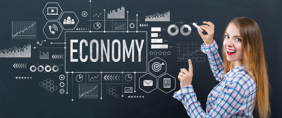 Economy with young woman writing on a blackboard