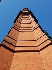 brick building corner with sky