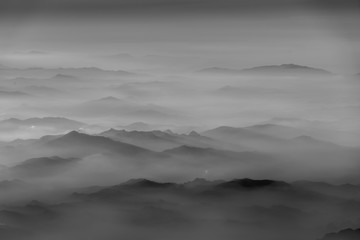 Fototapeta na wymiar Morning fog of mountains aerial view