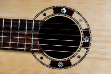 Obraz premium Closeup of rosette sound hole of an acoustic guitar