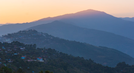 sun setting on the mountains of town of Mindat in the Chin State, Myanmar 