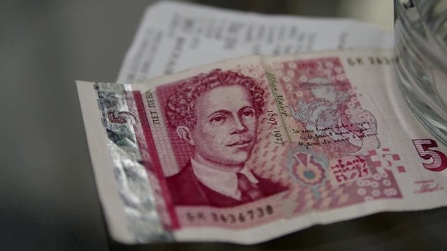 Banknote of Bulgarian leva flying in the wind