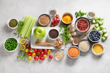 Fototapeta na wymiar Vegetables, fruit, grain, superfoods for vegan and vegetarian eating.