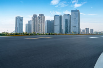 Fototapeta na wymiar Highway Road and Skyline of Modern Urban Architecture in Hangzhou..