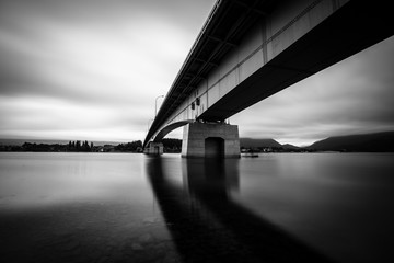 Long exposure beneath a bridge in lake kawaguchi near mount fuji