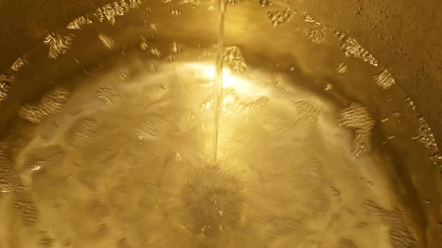 Growing distillery for the production of plum brandy by firing in a gas boiler, alembic pot still during process of distillation flow fresh plum brandy steel, bottles plum liquor slivovitz traditional