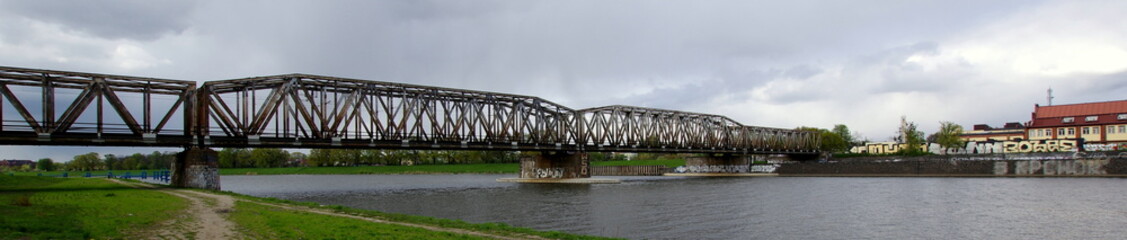 Fototapeta na wymiar A railway viaduct in Wroclaw leading across the Odra River