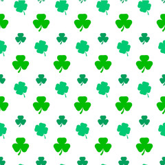 Fototapeta premium St. Patrick's day vector seamless background with shamrock. Vector clover leaf design.