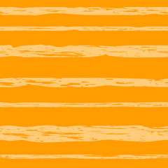 yellow grungy stripes on orange background. vector seamless pattern. textile paint. gold repetitive background. fabric swatch. wrapping paper