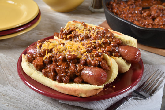Plump chili cheese dogs