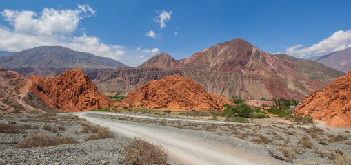 Panorama of a gravel road in the Andes mountain near Purmamarca, Argentina
