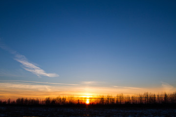 Sunset behind the forest