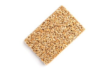 Sunflower seed kozinaki isolated on white background. Sweet bars with seeds and caramel. 