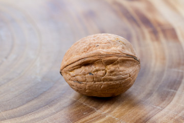 Walnuts on a wooden background