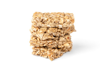 Sunflower seed kozinaki isolated on white background. Sweet bars with seeds and caramel. 